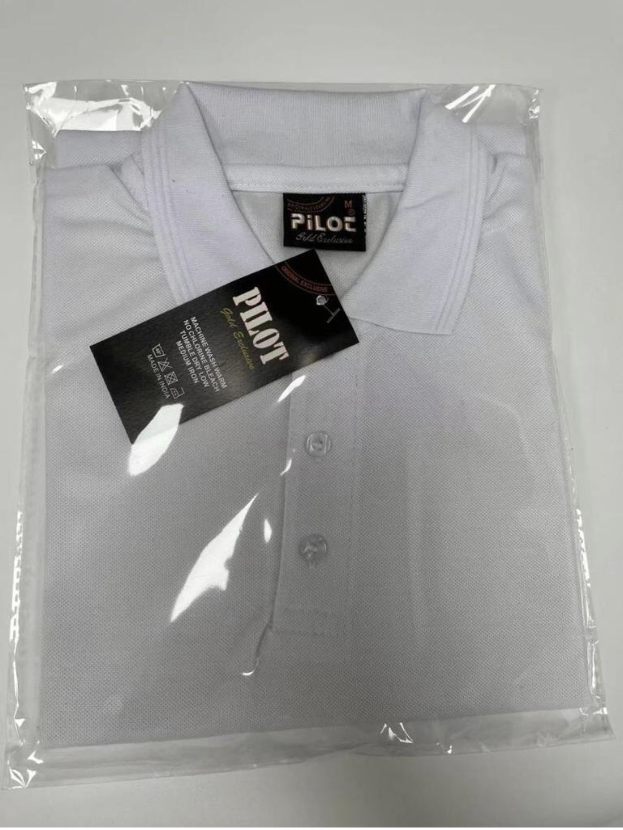polo pilote blanc