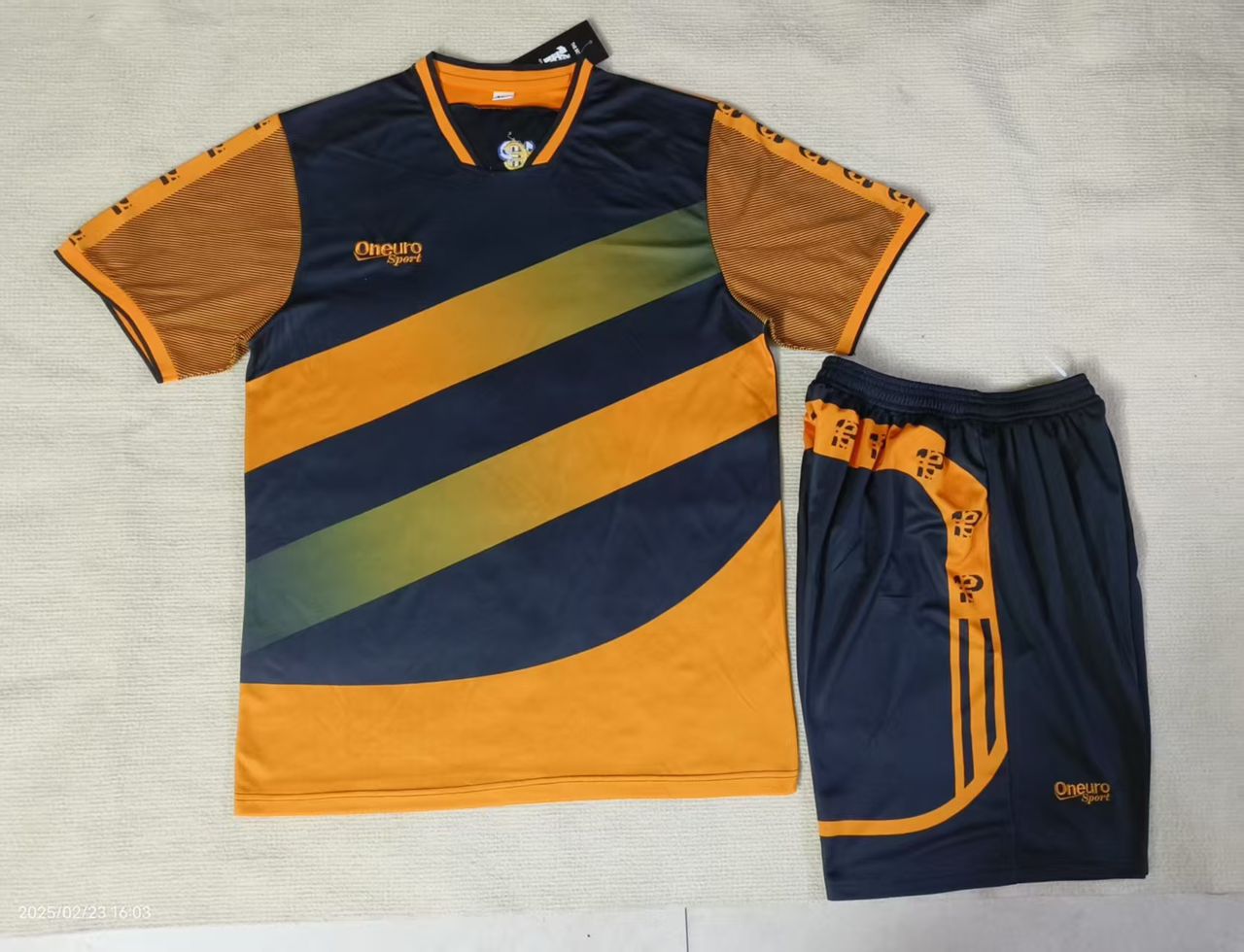 MAILLOT ONE EURO GROSSE BANDE NOIR ORANGE